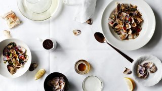 Stir-fried pipis with black bean, chilli and olive oil